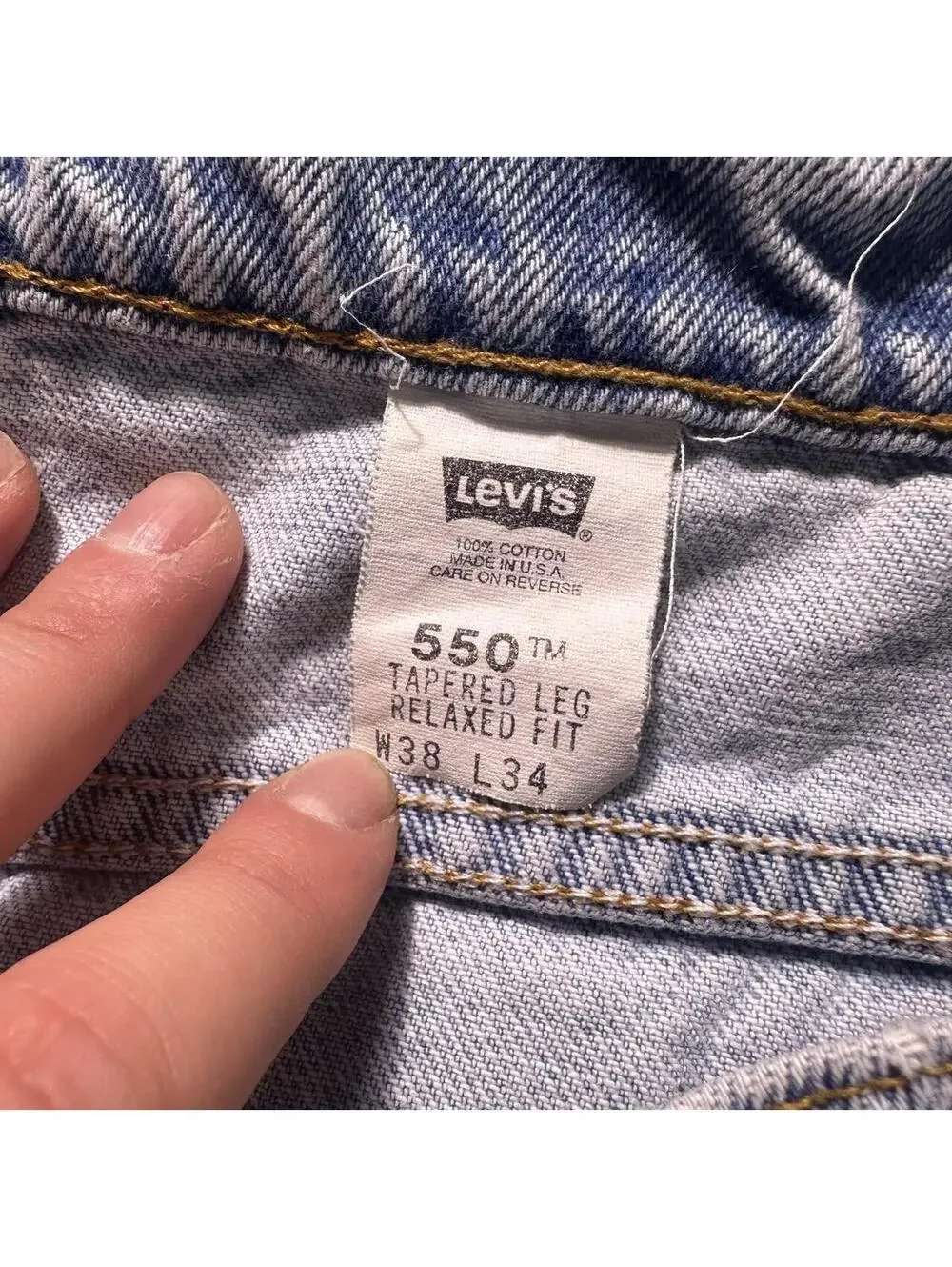 Retro paper tag Levi's 550 tapered leg relaxed fit blue denim jeans pants 38x34